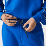 Lacoste מכנסי טרנינג ממותגים בגזרה דקיקה DZ4D0D975 כחול k1q גברים - Image 4
