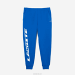 Lacoste מכנסי טרנינג ממותגים בגזרה דקיקה DZ4D0D975 כחול k1q גברים - Image 5