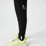 Lacoste מכנסי טרנינג ממותגים בגזרה דקיקה DZ4D0D973 שחור 031 גברים - Image 7