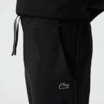 Lacoste מכנסי טרנינג ממותגים בגזרה דקיקה DZ4D0D973 שחור 031 גברים - Image 9