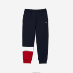 Lacoste מכנסי טרנינג ממותגים DZ4D0D3215 חוק כהה כחול לבן אדום ילדים - Image 5