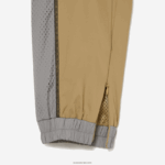 Lacoste מכנסי טרנינג עם אפקט מחורר DZ4D0D2427 בז' אפור 7je נשים - Image 6