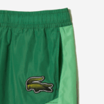Lacoste מכנסי טרנינג עם הדפסי לוח דמקה מסוג ombre DZ4D0D338 ירוק כחול צ'י גברים - Image 6