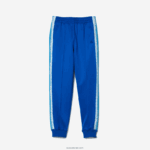 Lacoste מכנסי טרנינג עם פס לוגו DZ4D0D2407 כחול kxb נשים - Image 4