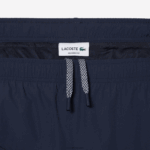 Lacoste מכנסי טרנינג עמיד למים DZ4D0D336 כחול kxe גברים - Image 5