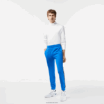 Lacoste מכנסי טרנינג עמידים בפני שחיקה DZ4D0D306 כחול kxb גברים