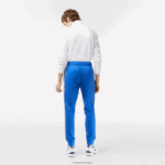 Lacoste מכנסי טרנינג עמידים בפני שחיקה DZ4D0D306 כחול kxb גברים - Image 3