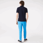 Lacoste מכנסי טרנינג פליסה בגזרה מחודדת DZ4D0D1086 כחול 4xa גברים - Image 4