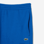 Lacoste מכנסי טרנינג פליסה בגזרה מחודדת DZ4D0D357 כחול kxb גברים - Image 4