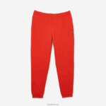 Lacoste מכנסי טרנינג פליסה בגזרה מחודדת DZ4D0D374 כתום 02k גברים - Image 4