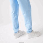 Lacoste מכנסי טרנינג פליסה בגזרה מחודדת DZ4D0D1008 כחול hbp גברים - Image 4