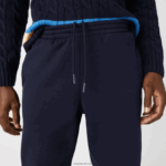 Lacoste מכנסי טרנינג פליסה בגזרה מחודדת DZ4D0D348 כחול כהה 166 גברים - Image 6