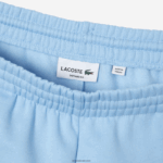 Lacoste מכנסי טרנינג פליסה בגזרה מחודדת DZ4D0D1008 כחול hbp גברים - Image 6