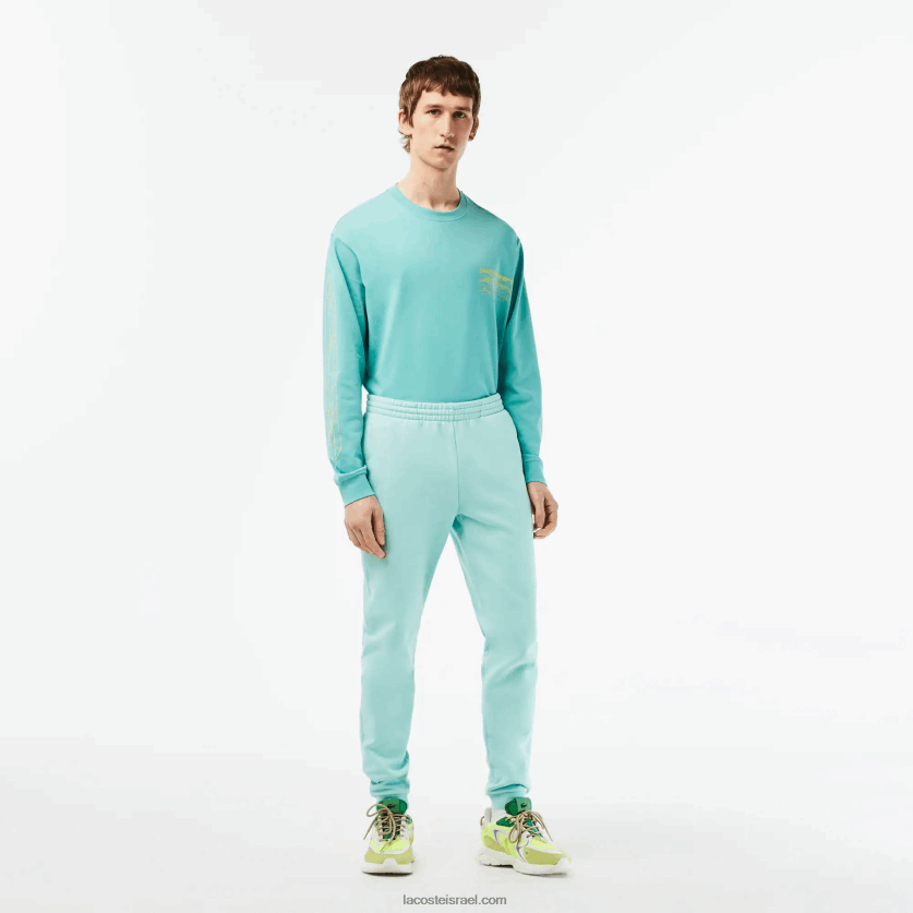 lacoste_d79ed79bd7a0d7a1d799_d798d7a8d7a0d799d7a0d792_d7a4d79cd799d7a1d794_d791d792d796d7a8d794_d79ed797d795d793d793d7aa_dz4d0.png Lacoste מכנסי טרנינג פליסה בגזרה מחודדת DZ4D0D345 מנטה lgf גברים - Image 1