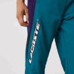Lacoste מכנסי טרנינג קולור בלוק בהתאמה רגילה DZ4D0D1111 ירוק סגול שחור n10 גברים - Image 4