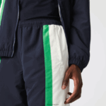 Lacoste מכנסי טרנינג קל משקל דוחה מים DZ4D0D1180 כחול נייבי לבן ירוק 19v גברים - Image 4
