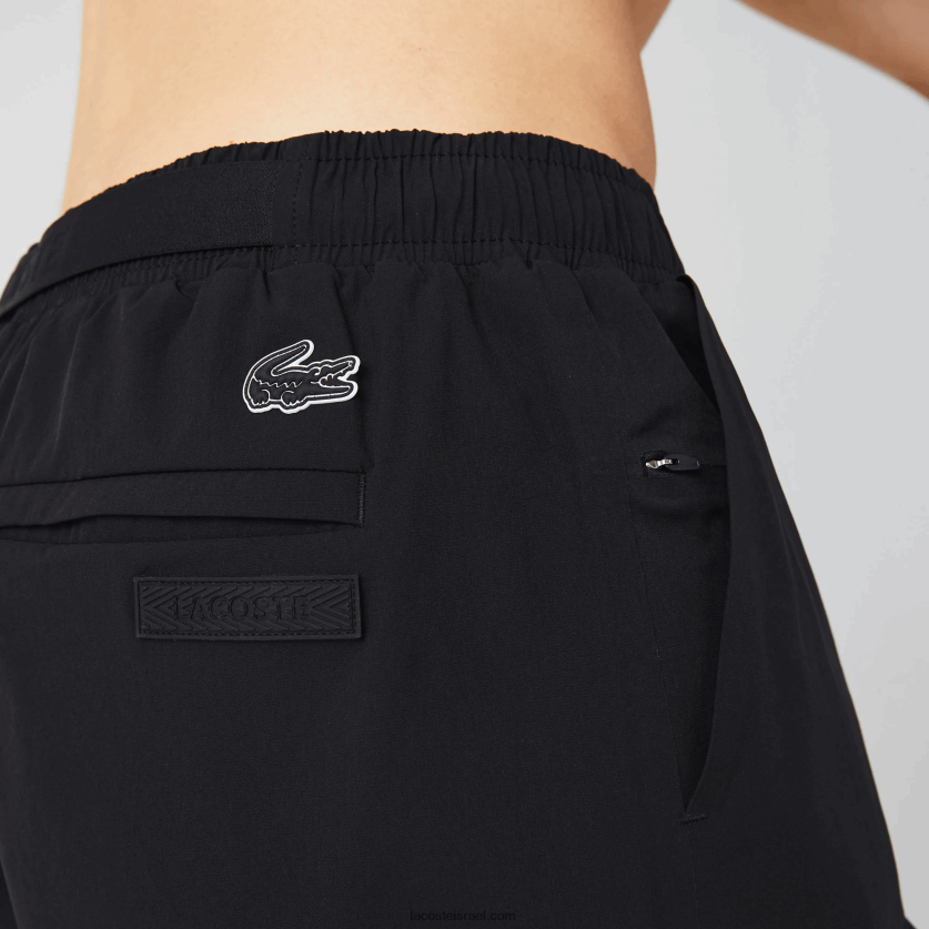 Lacoste מכנסי ים בהדפס ימי DZ4D0D1662 שחור לבן 9 מ"ר גברים - Image 4