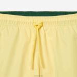 Lacoste מכנסי ים קלים לייבוש מהיר DZ4D0D539 צהוב ירוק 7sh גברים - Image 7