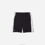 Lacoste מכנסי כותנה אורגנית בפס צבעוני DZ4D0D3089 כחול כהה אפור chine e6a ילדים - Image 4