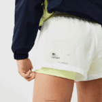 Lacoste מכנסי ניילון קלים ספורטיביים DZ4D0D2659 לבן צהוב צעקני 6b2 נשים - Image 7