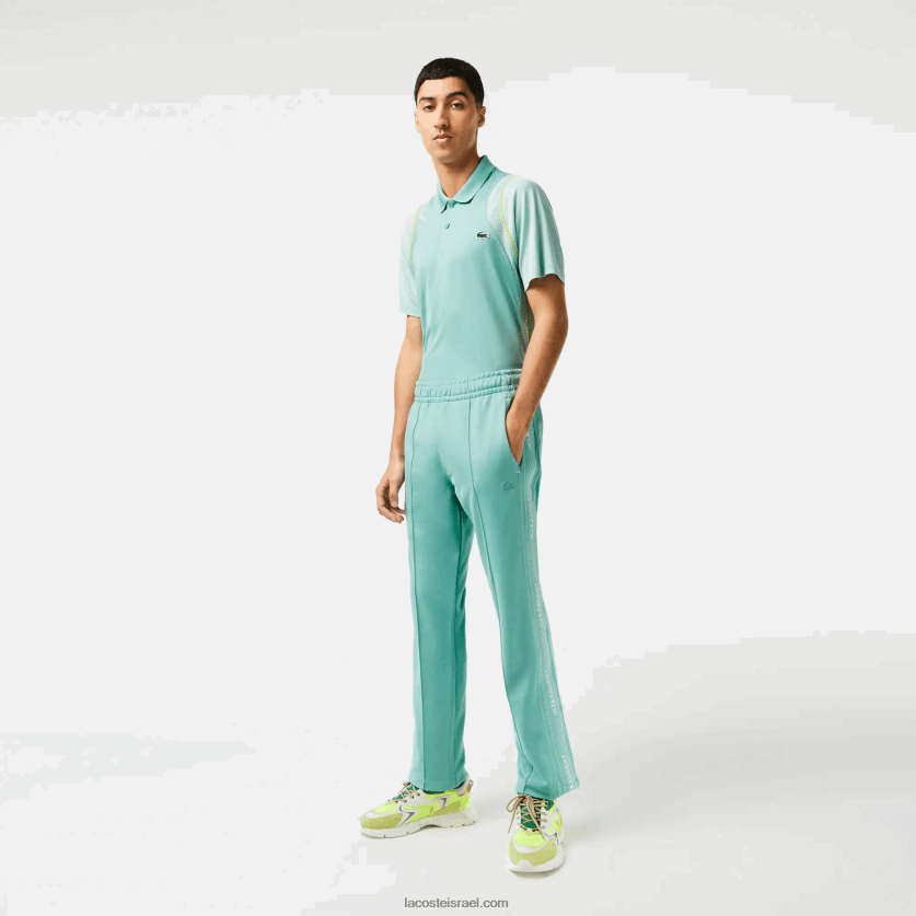 lacoste_d79ed79bd7a0d7a1d799_d7a4d799d7a7d794_d791d79bd795d7a9d7a8_d7a8d792d799d79c_dz4d0d337_d799d7a8d795d7a7_3a4_d792d791d7a8d7.png Lacoste מכנסי פיקה בכושר רגיל DZ4D0D337 ירוק 3a4 גברים - Image 1
