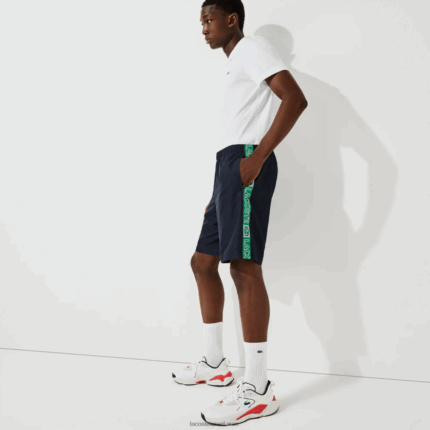Lacoste מכנסי צד ממותגי ספורט DZ4D0D1506 כחול כהה ירוק mr0 גברים