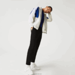 Lacoste מכנסי צ'ינס קלילים עמידים במים בכושר דק DZ4D0D1588 שחור 031 גברים - Image 7