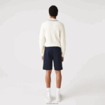 Lacoste מכנסי צמר מוברש בצבע בלוק DZ4D0D1516 כחול כהה צהוב 144 גברים - Image 3
