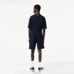 Lacoste מכנסי צמר מכותנה אורגנית לא מוברשת DZ4D0D487 כחול כהה 166 גברים - Image 3
