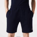 Lacoste מכנסי צמר מכותנה אורגנית מוברש DZ4D0D417 כחול כהה 166 גברים - Image 2