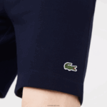 Lacoste מכנסי צמר מכותנה אורגנית מוברש DZ4D0D417 כחול כהה 166 גברים - Image 4