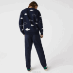Lacoste מכנסי ריצה מתיחה מכותנה DZ4D0D1164 כחול כהה 166 גברים - Image 3