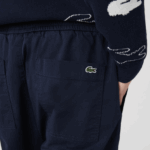 Lacoste מכנסי ריצה מתיחה מכותנה DZ4D0D1164 כחול כהה 166 גברים - Image 5