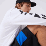 Lacoste מכנסיים קצרים עם אפקט טלאים בלוק צבעוני DZ4D0D1500 שחור כחול לבן se1 גברים - Image 9