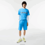 Lacoste מכנסיים קצרים עם הדפס רעיוני DZ4D0D1356 כחול 4xa גברים