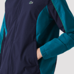 Lacoste מעיל גולף הניתן לאריזה ספורטיבית DZ4D0D1277 כחול כהה ירוק 6h2 גברים - Image 5