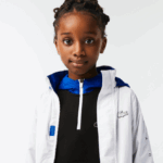 Lacoste מעיל דוחה מים ברדס נשלף DZ4D0D3240 לבן כחול שחור 9cw ילדים - Image 4