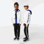 Lacoste מעיל דוחה מים ברדס נשלף DZ4D0D3240 לבן כחול שחור 9cw ילדים - Image 7