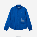 Lacoste מעיל ספורטיבי דוחה מים שניתן לארוז DZ4D0D2618 כחול k1q נשים - Image 5