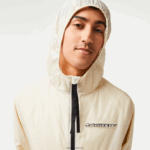 Lacoste מעיל קפוצ'ון קצר עם רוכסן DZ4D0D382 לבן שחור aj8 גברים - Image 2