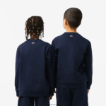 Lacoste סווטשירט קולורבלוק ממותג ניגודי DZ4D0D3055 כחול כהה לבן 525 ילדים - Image 3