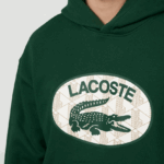 Lacoste סווטשירט קפוצ'ון מונוגרמה ממותג בגזרה רופפת DZ4D0D970 ירוק 132 גברים - Image 4
