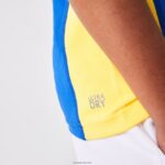 Lacoste פולו טניס פרטני רשת בכושר רגיל DZ4D0D3169 ירוק כחול צהוב y31 בנים - Image 2